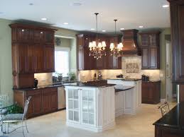 Kitchen remodel kitchen design kitchen decor all white kitchen kitchen cabinets color combination green kitchen cabinets kitchen renovation kitchen here are 20 cabinet color combinations to try in your kitchen. Transformedinteriors On Twitter Gorgeous Timeless Kitchen The Cherry Cabinets Mix Well With The White Island Cabinets The Sims Lohman Granite Is Perfectly Paired With The Sherwinwilliams Clary Sage Wallcolor Interiordesign Kitchendesign