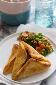 Moisten edges with water and press with a fork to seal. Lebanese Meat Pies Recipe Sfeeha Little Spice Jar