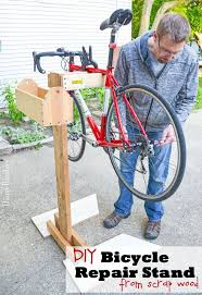 Make Your Own Bicycle Repair Stand Bike Tutorial Learn How To Make A Bicycle Repair Stand Out Of Wood Scraps This Bicycle Diy Bike Work Stand Bike Stand Diy