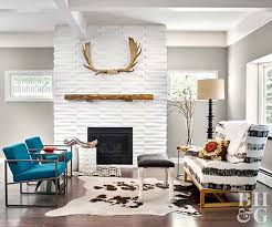 A simple pipe and wood shelving unit paired with gray and leather furniture keep the lines clean and modern. 5 Ways To Decorate With Leather Furniture Better Homes Gardens