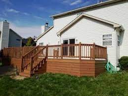 Choosing a deck stain color can be a challenge, especially when you don't have a paint/stain chart brochure that you can take home. Sherwin Williams Woodscapes Exterior Stain In Covered Bridge Front Porch Design Porch Design Staining Deck