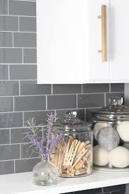 Cheap backsplash ideas are always looked for by many homeowners especially if they want to however copper options are also available. Laundry Room Update With Peel And Stick Tile Backsplash Lydi Out Loud