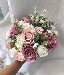 We didn't have bridesmaids or groomsmen and my father didn't walk me down the we didn't throw a bouquet or toss a garter. Read Information On Floral Arrangements For Weddings Having Someone Close To You Get Orda Bridal Bouquet Bridesmaid Flower Bouquet Ivory Bridesmaid Bouquets