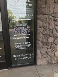Signage On Glass Pane On Aurora Pediatric Dentist Comfort Dental Kids In 2020 Dental Kids Pediatric Dentist Dentistry For Kids