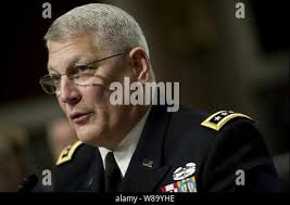 Department of Defense General Counsel Jeh C. Johnson and U.S. Army Gen. Carter  Ham conduct a press briefing in the Pentagon discussing the public release  of the "Don?t Ask, Don?t Tell" Comprehensive