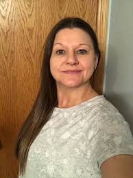 New hairstyle for women over 50 with shorter cut and lighter color