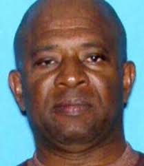 Police arrest man accused in machete deaths of wife, child