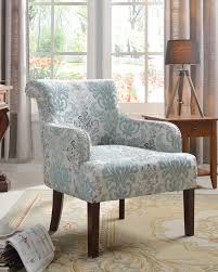 With Its Modern Curved Back And Paisley Fabric Print This Will Be A Great Additional To Your Blue Accent Chairs Light Blue Living Room Blue Chairs Living Room