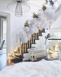 We Love This Lofty Holiday Decor Idea This Would Also Make For A Perfect Winter Wedding In 2020 White Christmas Decor Christmas Staircase Christmas Stairs