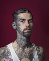 Photographer Tries To Show The People Behind Their Facial Tattoos