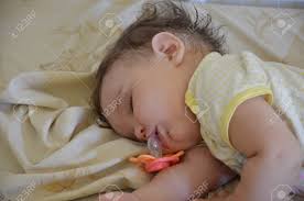 Maybe you would like to learn more about one of these? Cute Newborn Baby Sleeps Open Mouth Nipple Fell Out Stock Photo Picture And Royalty Free Image Image 93734988