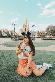 Magic Kingdom Hub Grass Photo In 2021 Disney Starbucks Magic Kingdom Disney Outfits