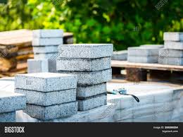 The laying of the paving slabs would not be considered tricky, but the handling and the cutting may be a different story. Stack Concrete Paving Image Photo Free Trial Bigstock