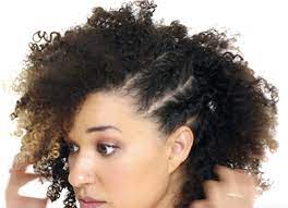 This is a soft and romantic braided side upstyle for naturally curly hair. Side Braid Tutorial For Curly Hair Girls Purewow