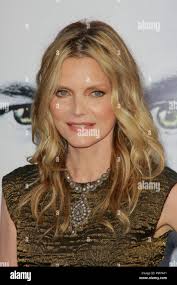 Michelle Pfeiffer at the World Premiere of Warner Brothers Pictures' "New  Year's Eve". Arrivals held at Grauman's Chinese Theatre in Hollywood, CA,  December 5, 2011. Photo by Joe Martinez