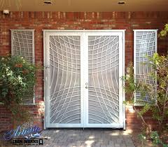 Pin By Artistic Iron Works On Wrought Iron Security Doors Wrought Iron Security Doors Security Door Iron Security Doors