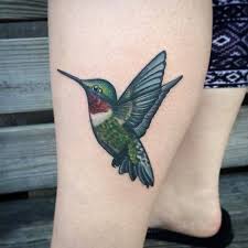 Creative hummingbird tattoo design on arm. 99 Stunning Hummingbird Tattoo Ideas