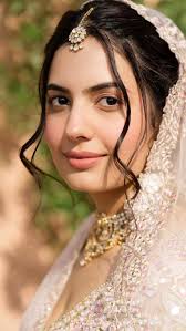 Aisha, a vision of soft romance, blooms like an English rose