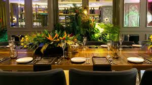 The wine room seats 20 people. A Look Inside Qt Melbourne S Lavish New Plant Filled Private Champagne Room Concrete Playground