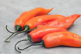 Foto De Aji Amarillo Pimenta Quente Em Fundo De Pedra E Mais Fotos De Stock De Amarelo Istock
