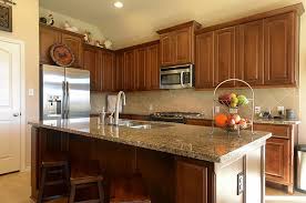 Mdf finds its most common use in kitchen cabinets. Countertop And Backsplash That Goes With Medium Wood Cabinets Grey Countertops Countertop Colours Wood Cabinets