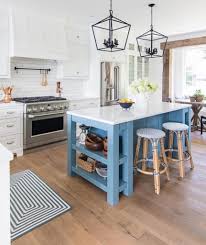 When it comes to seating at an island, both the chair/stool and island design must be taken into account. 15 Blue Kitchen Islands Their Paint Colors Chrissy Marie Blog