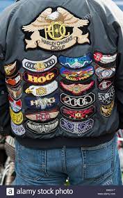 Download This Stock Image Biker Wearing A Leather Jacket Covered In Harley Owners Group Badges E8dc17 From Alamy S Libr Biker Wear Leather Jacket Men Harley