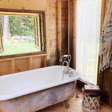 Beadboard is a traditional feature in the bathroom, but by keeping the natural wood coloring, this bathroom has an edgier, rustic feel. 20 Best Rustic Bathroom Design Ideas To Try At Home
