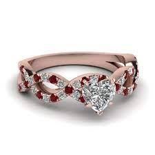 Red gemstone engagement rings are traditionally associated with passion, bravery, and spirit, and make a piece of jewelry particularly meaningful. Heart Infinity Diamond Engagement Ring With Ruby In 18k Rose Gold Fascinating Diamonds