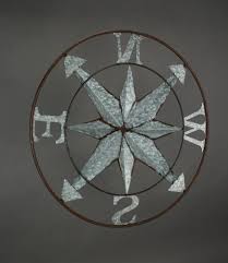 The flower wall decor also looks great indoors, and is an affordable way to brighten up the kitchen, bathroom, bedroom or any bare wall space. Distressed Galvanized Zinc Finish Compass Rose Metal Wall Hanging 24 Inch Diameter One Size King Soopers