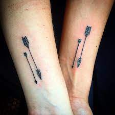 Feminine tribal tattoos often contain flowers. 65 Mother Daughter Tattoos That Are Mighty Beautiful