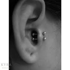 The tragus piercing area must be kept clean and tidy by soaking a clean cotton ball in a disinfectant or a saline solution and gently applying it in and around the pierced area. Double Tragus Piercings
