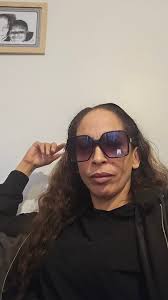 What are the challenges of managing multiple cameras and lighting cords in  a busy surgical setting?