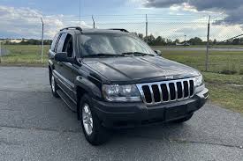 Image result for Brilliant Black 2003 Jeep