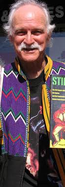 Bob Marley book author David Cupples holds "Stir It Up" novel