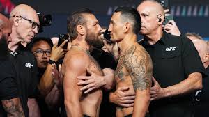 McGregor e Holloway fazem última encarada antes do UFC 329; veja como foi