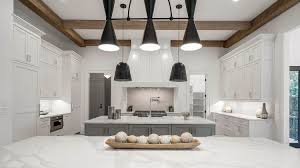 Thick faux wood beams rib the flat ceiling, matching the wooden cabinetry and flooring. Coffered Ceiling Ideas High End Designs And Ideas