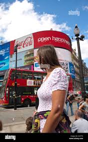 Piccadilly circus london woman hi-res stock photography and images - Alamy
