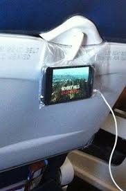 If The Back Of Your Plane Seat Doesn T Have Tvs Put Your Phone In A Plastic Bag And Hook It To The Back Of The Tray Table Or Use A Barf Bag