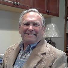 What is the purpose of survey stakes and red ribbon