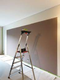 hoe verf je zo n strak kader muur zwarte muur roze woonkamer