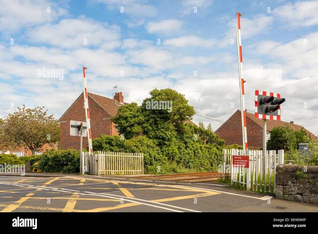 Level crossing gate hi-res stock photography and images - Alamy