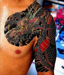 Black And Red Japanese Sleeve Tattoo Guy With Shiny Red And Black Japanese Sleeve Tattoo Japanese Dragon Tattoo Half Sleeve Tattoos For Guys Japanese Tattoo