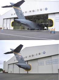 The doors of the C-17 Corrosion Control Hanger at Hickam Air Force Base on  Oahu were specifically made to be fitted around the large aft of a  Globemaster III… : rinterestingasfuck