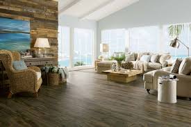 The wooden floor is much better than a concrete floor. Coastal Beach House Living Room Dark Wood Look Design Ideas Flooring America