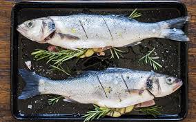 Whole Roast Sea Bass Stuffed With Garlic And Rosemary Whole Sea Bass Recipes Sea Bass Sea Bass Recipes