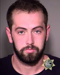 Grand jury clears pair accused of hitting man in MAGA hat