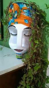 Using the scissors, remove the top and handle of the plastic bottle. Milk Jug Planters With Faces Eco Friendly Diy Ideas Balcony Decoration Eco Friendly Garden Ideas