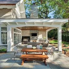 This patio idea features a single patio furniture in the form of a blue wooden armchair to better enjoy the view. Outside Covered Patios 1000 Ideas About Outdoor Covered Patios On Pinterest Covered Outdoor Patio Designs Patio Design Patio