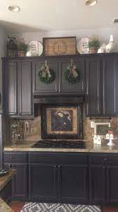 A series of pitchers filled with faux flowers is also an ideal way to fill the void. Kitchen Cabinet Ideas We Like Our Kitchens We Spend So Much Time In Them Decorating Above Kitchen Cabinets Farmhouse Kitchen Decor Farmhouse Style Kitchen